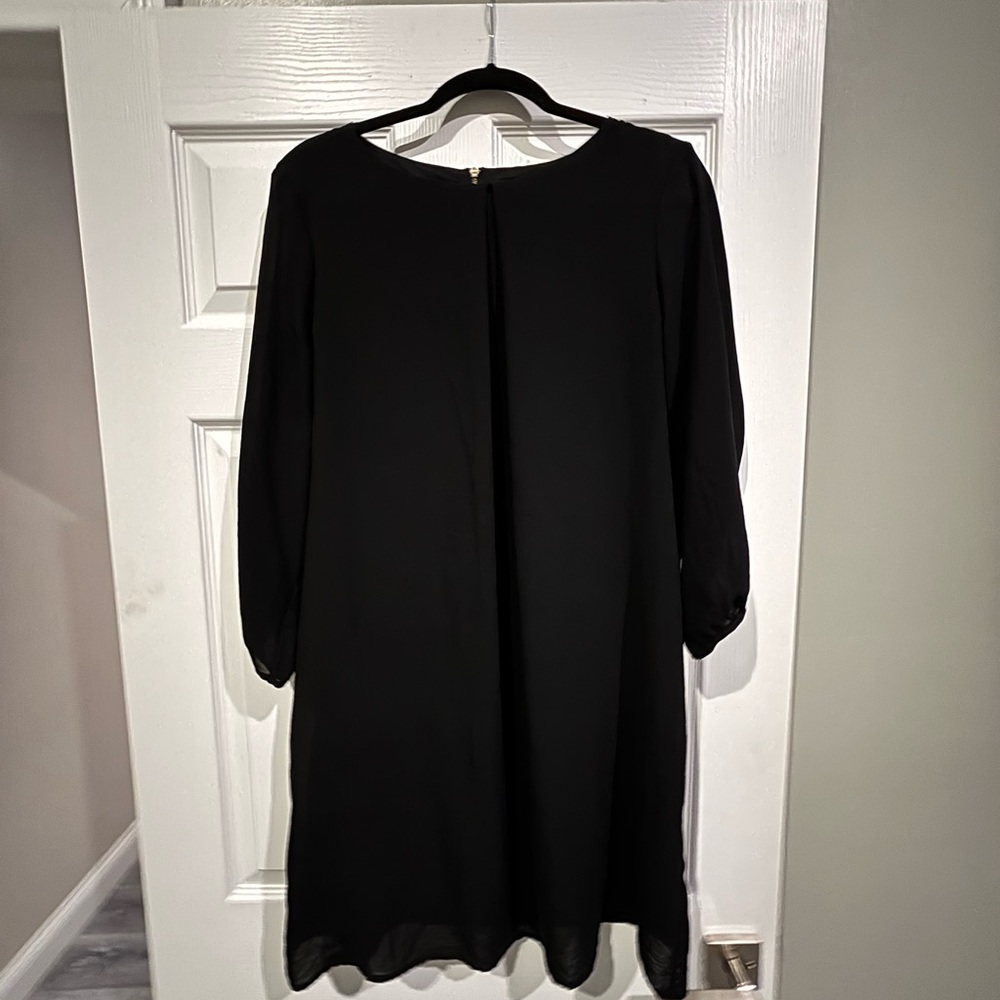Black shift dress with pleat